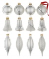 A very merry tree will take shape with silver glass ornaments from Martha Stewart Collection. Ball, bell and drop shapes tinged with radiant silver glitter fill out its branches with timeless grace.