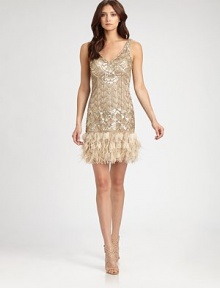 Shimmering sequins and lush ostrich feathers give this chic design a distinctly 1920s sensibility.V necklineSleevelessSequined embroideryOrganza petal appliquésOstrich feather trimConcealed side zipFully linedAbout 20 from natural waistNylonSpot cleanImportedModel shown is 5'11 (180cm) wearing US size 4. 