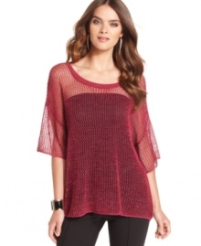 A hot layering piece, this Kensie open-stitch sweater adds on-trend texture to any outfit!