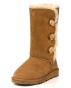 The latest craze from UGG® Australia is the Bailey Button boot featuring a trio of buttons on the side. With shearling lining to keep her feet in ultimate comfort.