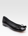 Glossy patent leather flat has comfortable ultrasuede lining and molds perfectly to the foot for a tailored fit. Patent leather upper Ultrasuede lining Leather sole Padded insole Imported