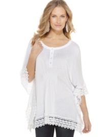 Romantic and free-flowing, Fever's lace-trimmed tunic works as a top with your favorite jeans or as a cover-up for your swimsuit!