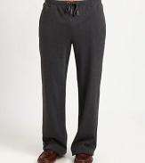 Designed for maximum comfort and fit, the cotton interlock of this lounge pant features a smooth finish and natural stretch with elegant style.Drawstring tie-waistSide slash, back welt pocketsInseam, about 32CottonMachine washImported