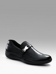 Soft calfskin with strap and logo buckle detail. Leather lining Padded insole Leather sole Made in Italy 