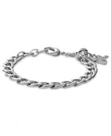 Fossil proves to be quite charming with this bracelet. The silver-tone mixed metal bracelet features a glass crystal pave heart and key details for added appeal. Approximate adjustable length: 7-3/4 inches.