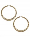 Betsey Johnson spices up classic hoop earrings with crystal accents and hearts. In goldtone mixed metal. Approximate diameter: 1-3/4 inches.