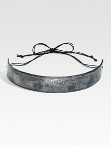 An oxidized finish lends a rustic look to this bold metal belt. Oxidized metal Cotton cord tie closure About 1 wide Imported 