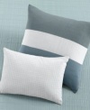 A colorblocked panel across the front adds a modern look to this decorative pillow from the Cottonwood collection.