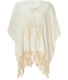 With a 1970s feel, this luxe poncho-style top from Anna Sui has all the right trends of the season -Round neck with tie, dolman sleeves, pintuck front with feather fringe embellishment, all-over lace detailing, feather fringe detailed hem - Wear with cut off jean shorts, platform pumps, and a fringed shoulder bag