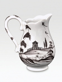 A winsome yet modern pitcher features age-old decorative techniques in fine stoneware, lending a dash of adventure to any culinary creation. From the Country Estate CollectionCeramic stoneware3 oz. capacity3½ highDishwasher- & microwave-safeImported