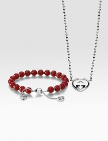 From the Love Britt Collection. A sleek set in sterling silver and warm wood with iconic GG accents, perfect for your valentine. Sterling silverVarnished wood beadsNecklace length, about 15Pendant size, about ¾Adjustable bracelet Lobster clasp bracelet closureLobster clasp necklace closureMade in Italy