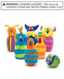 This wacky bowling set features six furry, funky-textured pins and one beastly ball! Measures 8.5 x 7 x 9.