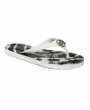 Tie-dyed flip flops are always fun. MICHAEL by Michael Kors' MK flip flops feature a metallic brand logo on the vamp.