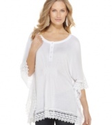 Romantic and free-flowing, Fever's lace-trimmed tunic works as a top with your favorite jeans or as a cover-up for your swimsuit!