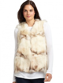 THE LOOKPlush dyed raccoon fur constructionHook-and-eye closureTHE FITAbout 23 from shoulder to hemTHE MATERIALRaccoon furFully linedCARE & ORIGINClean by fur specialistFur origin: USAMade in USAModel shown is 5'9½ (176cm) wearing US size Small. 