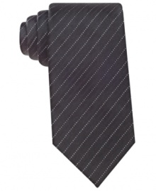 Stay in the spotlight with this striped silk tie from Geoffrey Beene.