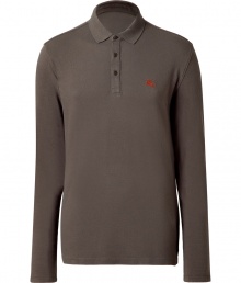 A versatile casual favorite, the classic polo gets a modern update with this slim long sleeve version from Burberry Brit - Spread collar, front button placket, long sleeves, slim fit, logo detail at chest - Wear with straight leg jeans or chinos, a parka, and boots