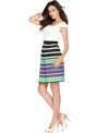 Stunning stripes adorn the skirt of this Tahari by ASL dress, contrasting the solid bodice brilliantly. The multiple tones mean pairing shoes is a cinch!