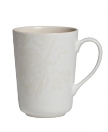 The elegant Bliss mug from Monique Lhuillier for Royal Doulton is made for every day, shaped for modern decor and draped with romantic florals in a soft, muted palette.