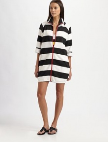 Bold black and white stripes with a contrasting red zipper make this coverup a must-have this season.Stand collarThree-quarter sleevesFront zipperSlash pocketsCottonMachine washMade in USA of Italian fabric