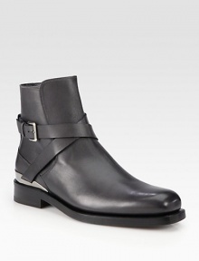 A classic chelsea boot style receives a downtown edge, constructed from fine Italian leather with wrap buckle detail and metal inserts on the heel and sole.Leather upperLeather liningPadded insoleLeather soleMade in Italy