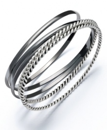 Add instant style with stackable bangles. Alfani's trendy set features five silver tone and hematite tone mixed metal bangles in varying textures. Approximate diameter: 2-3/4 inches.