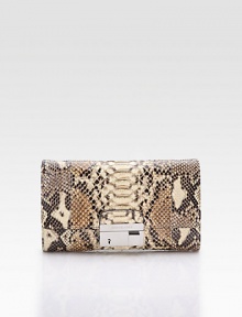 Exotic python skin adds sumptuous luxury to this slim flap bag finished with a detachable shoulder strap for versatility.Detachable shoulder strap, 20½ drop Buckle lock closure One outside pocket One inside open pocket Leather lining 9W X 6H X 1D Imported