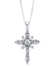 A sparkling symbol of faith. This beautiful cross pendant features round and baguette-cut diamonds (1/2 ct. t.w.) in 14k white gold. Approximate length: 18 inches. Approximate drop: 1-1/16 inches.