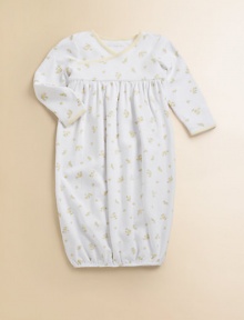 An adorable long-sleeved gown is rendered in soft, cotton jersey with a sweet duck print.Cross-wrap necklineLong sleevesPullover styleGathered empire waistElastic bottom bandCottonMachine washImported