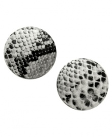 Biting style in black and white. These button earrings from GUESS feature a cool snake print, crafted in imitation rhodium-plated mixed metal. Approximate diameter: 1 inch.