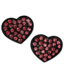 A bouquet of love, by GUESS. These darling stud earrings feature a heart silhouette with a lovely touch of rose-colored glass accents. Crafted in sprayed jet tone mixed metal. Approximate diameter: 1 inch.