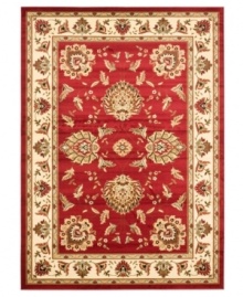 Bring the brilliance of ancient Persian textile design home with this vibrant red Lyndhurst area rug from Safavieh. Crafted from soft polypropylene, this rug radiates timeless allure with the added convenience of easy-care construction. (Clearance)