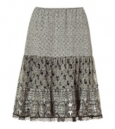 Elegant A-line skirt is typical of Anna Sui with a decorative print of black and white in pure silk - Comfortable, thin elastic waist - Texture changes from smooth, to soft pleats, to lace trim - Pleasant length falls at knee, making it perfect for most occasions - Pait with favorite heels, fitted top and cashmere cardigan for the office, or a tank and flats for a casual after-hours look