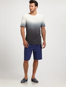 A cotton classic refreshed with ombre dip dyeing that starts at the chest and fades to black at the hem. Banded crewneckShort sleevesCottonMachine washImported