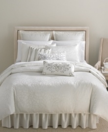 This quilted sham features a lush linear quilting pattern in soft, shimmering fabric that enhances this Martha Stewart Collection bedding with beautiful simplicity.