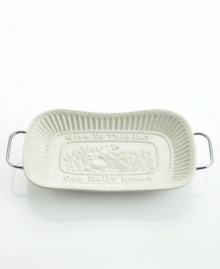 Appropriately embossed with Give Us This Day, Our Daily Bread, this porcelain bread tray warms your table with traditional charm. Beaded and fluted, the ornate rim frames the famous phrase and a field of wheat. Set in a metal rack.