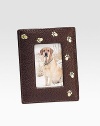 Handcrafted of French goatskin with a gold trail of paw prints, it's an ideal display for the four-legged love of your life. Holds 2¾ X 3¾ photo Made in USA Additional InformationShipping timeline for this itemThis item cannot be shipped via Rush, Next Business Day, Saturday delivery.This item cannot be shipped to a P.O. Box, APO/FPO or U.S. Territory. This item will ship directly from the vendor. Gift wrap not available for this item. 