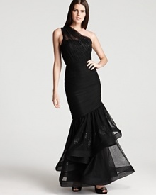 Subtle embellished details add understated shimmer to a dramatic ML Monique Lhuillier dress.