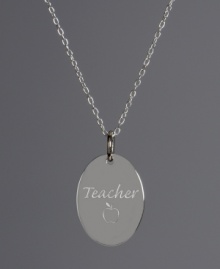 The perfect gift for your favorite educator. This oval-shaped pendant highlights the engraving Teacher with an apple. Crafted in sterling silver. Approximate length: 18 inches. Approximate drop: 3/4 inch.