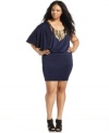 Score party-perfect style with Baby Phat's asymmetrical sleeve plus size dress, showcasing an embellished neckline.