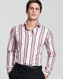 Boasting fine stripes in bold hues and a sleek, slim fit, this dashing Salvatore Ferragamo sport shirt is modern take on the classic style.