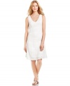 An allover burnout texture adds a stylish dimension to this bright white Calvin Klein dress -- a hot pick for a summer look!