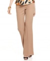 Crepe fabric creates a fluid drape on Nine West's office-ready trousers. A wider, trouser-cut leg creates the illusion of smaller hips and waist.