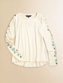 A delicate arrangement of beaded flowers adorns the sleeves of this adorable cotton jersey tee.Ribbed boatneckLong raglan sleevesPullover styleCurved frayed hemCottonMachine washImported