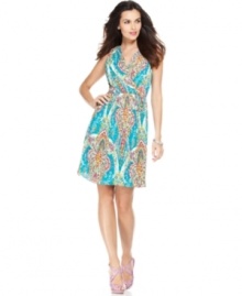 Ellen Tracy's fully pleated dress is an ode to spring with its bright paisley print and swingy, feminine fit.