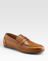 Rich suede style crafted in Italy with penny loafer detail. Leather lining Padded insole Rubber sole Made in Italy 