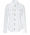 Western-chic style button-down shirt of pure, white cotton - Features large silver-colored double buttons and two adorned  front pockets - Short collar, trim sleeves and rounded hem - Pair with white capris and sandals, or with a pencil skirt or fitted black pants and heels