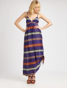 Woven maxi dress with adjustable shoulder straps and side knot detail in a stripe serape print.V-neckEmpire bandSide pocketsInvisible back zipperAbout 40 from natural waistCottonDry cleanImported Model shown is 5'9½ (176cm) wearing US size Small 