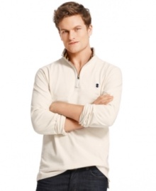 Pull on this quarter-zip sweater from Izod for a warm look for when the temperature drops.