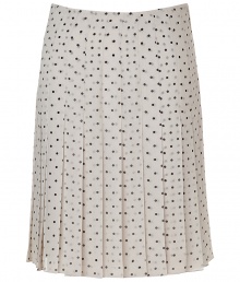 Elegant pleated skirt in fine ivory silk - Retro chic meets modern sophistication - On-trend black polka dot motif - Slim cut, hits at knees - Pleats swing lightly when walking - Polished, smart and sexy, ideal for work, cocktails and parties - Pair with a twin set or blazer and button down blouse, style with pumps or mules